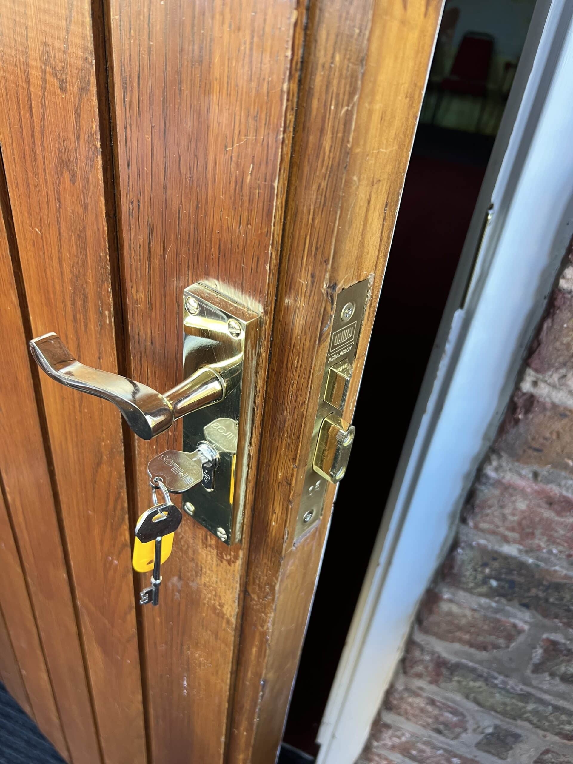 A newly fitted Formby church door handle with a set of keys in it.